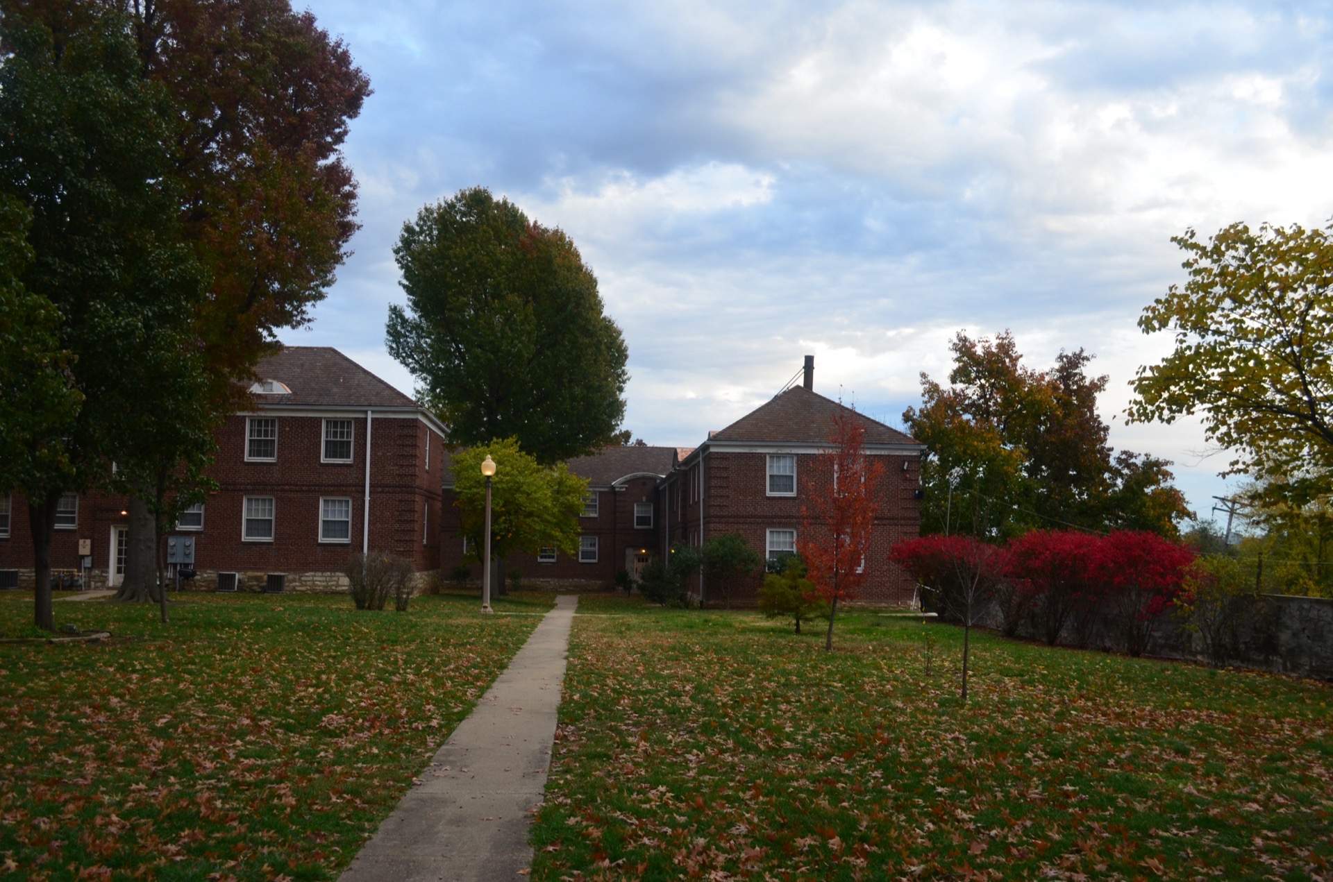Wide view of Jefferson Heights Apartments grounds in fall