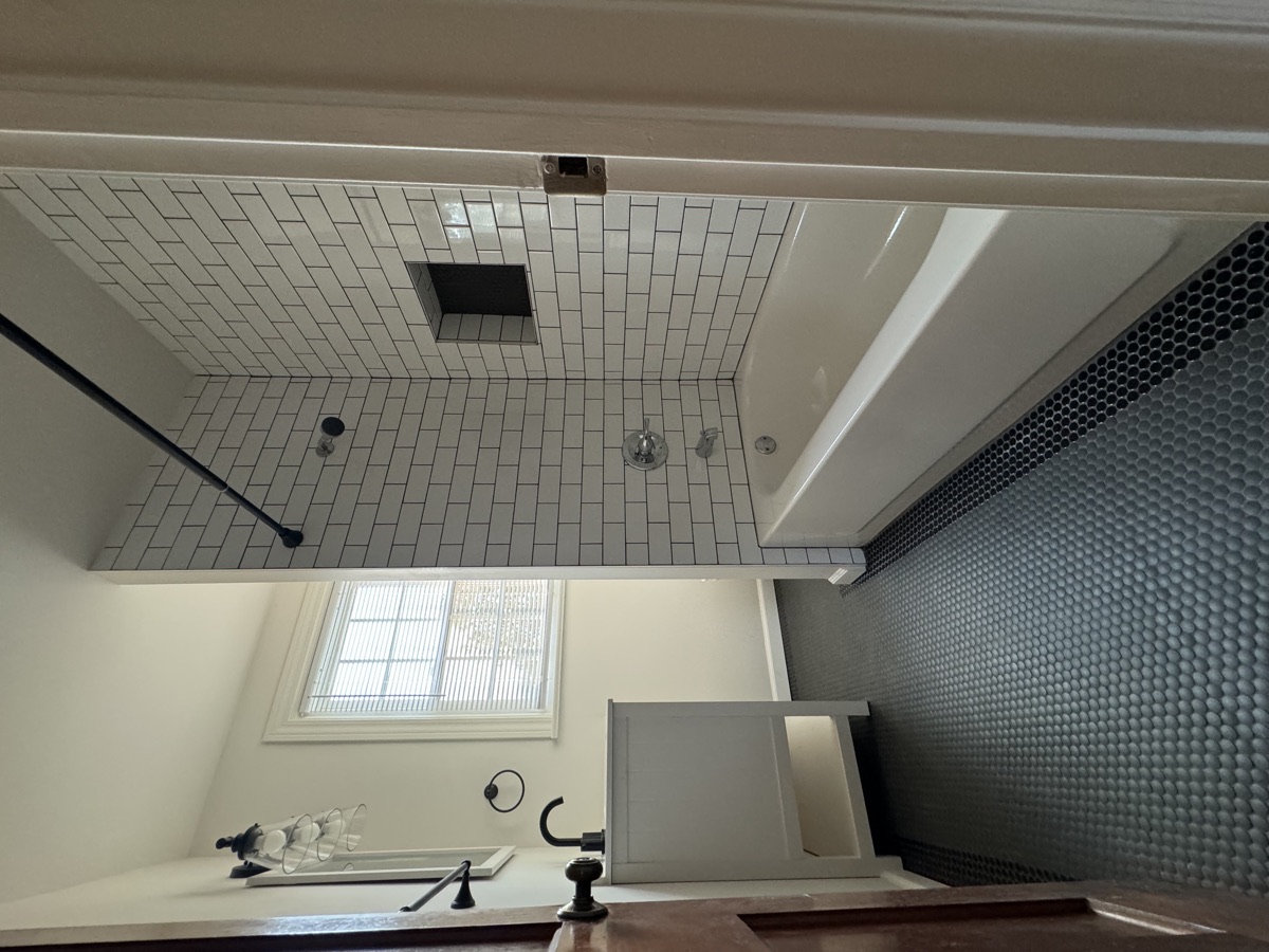 Remodeled bathroom with subway tile
